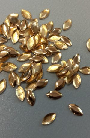 18-11 Arany színű felvasalható dísz 100db