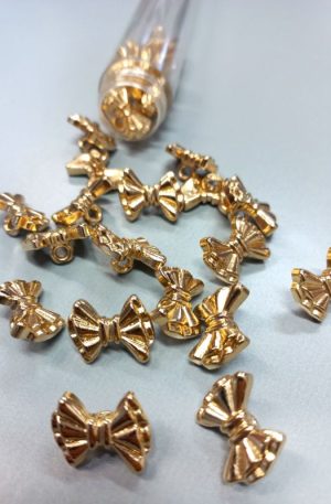 01-155 Arany színű műanyag gomb