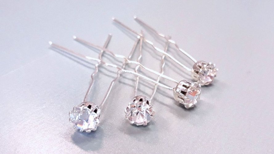 Kristály díszítésű hajtű. Csomagonként 4db hajtű.

Métere: 7 cm hosszú